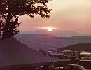 1980-Sun sets behind Berk. Mts. FB Fest. Performer's Tent (Patricia Gilligan)